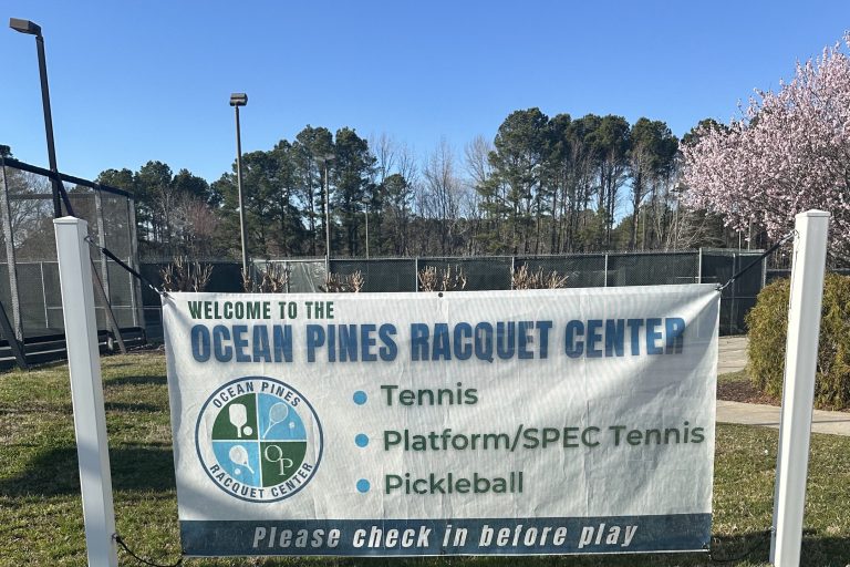 Pines racquet center sign