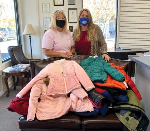 •Coat Drive Co-Chair Sue Wineke delivered 100 coats to Diakonia to Jennifer Trager